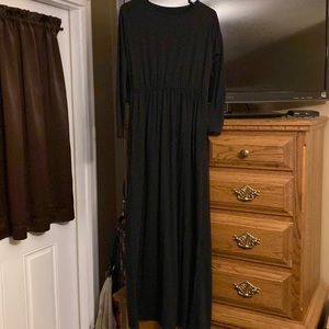 Brand New black maxi dress with pockets and 3/4 sleeves.